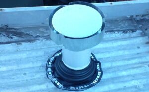 Image 3: The newly installed flue venting directly outside