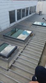 Acrylic dome skylights have been replaced by Velux glass skylights (image)