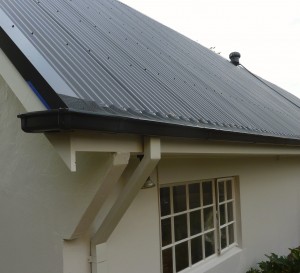 Leafguard on colorbond corrugated roof with quad gutter Viewbank