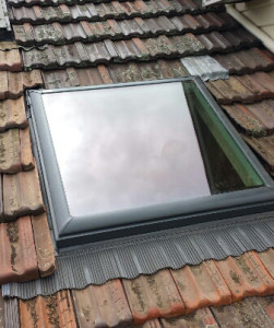 Perspex skylight replaced with Velux Skylight VS S06 Kew - after (image)