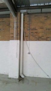 New PVC downpipe and sump installed - Hawthorn East (image)