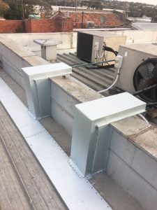Flashings installed to ac pipes to prevent water ingress - Balwyn North (image)