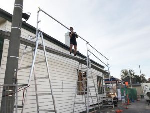 Roof plumbers setting up for safe access - Albert Park (image)