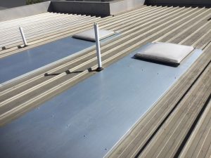 Commercial roof leaks repaired (image)