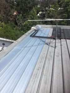 Kliplok roof sheets replaced and wider apron flashing - Greensborough (image)