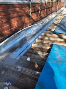 Commercial building box gutter and flashing repairs - Altona