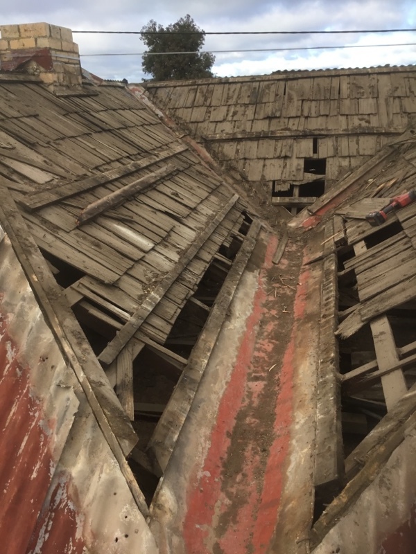 Metal roof removed for access to the box gutters. Now for the shingles | Roof Replacement | Before | Coburg | Melbourne | Roofrite