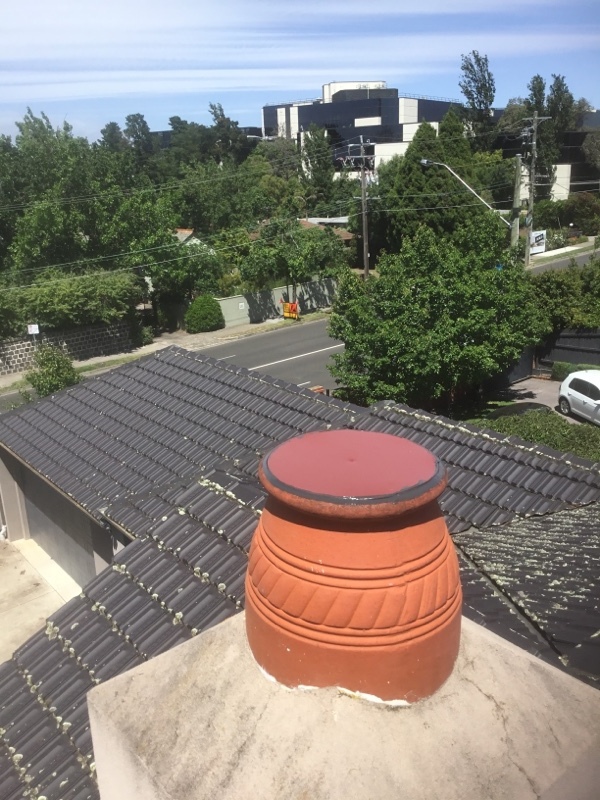 Chimnet Capping form terracotta Chimney | Hawthorn East | Roofrite Chimnet Capping form terracotta Chimney | Hawthorn East | Roofrite