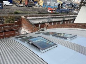 Velux Skylights Installed in Curved Metal Roof | Brunswick | Melbourne | Rooofrite
