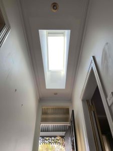 Velux SkylightFS C06 | Fixed Skylight with Shaft and Solar Honey Blind Installed in Hall | Armadale | Roofrite