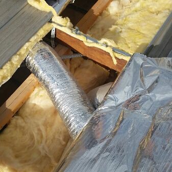 Insulation batts and foil installed into flat roof - Melbourne (image)